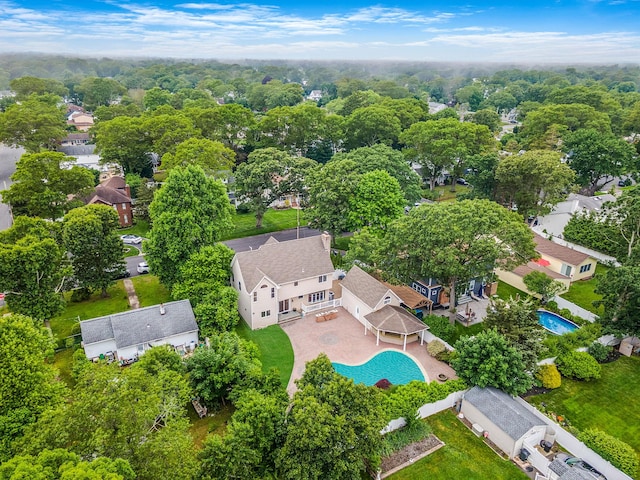 53 Pequot Ln, East Islip, NY 11730 - aerial perspective of suburban area featuring a pool area