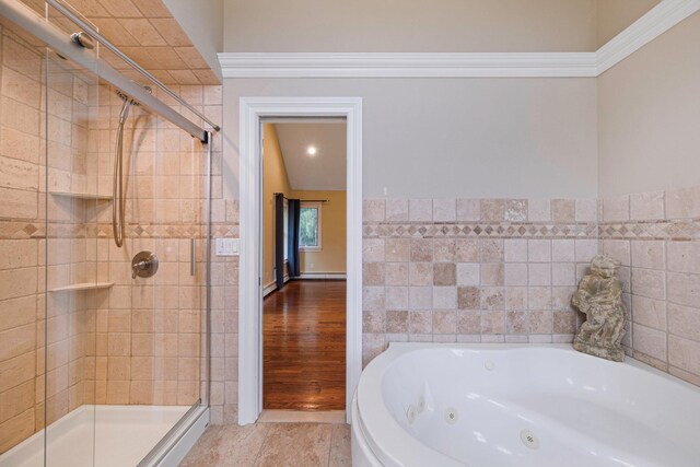 53 Pequot Ln, East Islip, NY 11730 - bathroom featuring a jetted tub, a shower stall, and tile walls
