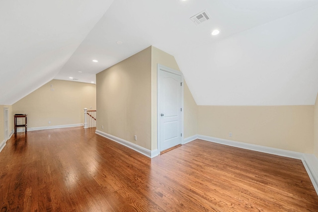 53 Pequot Ln, East Islip, NY 11730 - bonus room with vaulted ceiling, wood finished floors, and recessed lighting