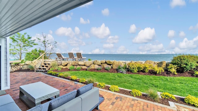 12910 Main Rd, East Marion, NY 11939 - view of patio / terrace with a water view and an outdoor living space
