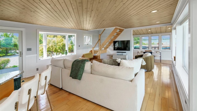 12910 Main Rd, East Marion, NY 11939 - living room featuring wood ceiling, wainscoting, stairway, light wood-type flooring, and recessed lighting