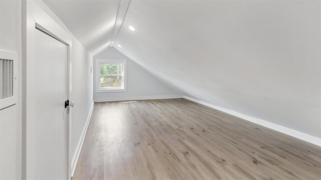 12910 Main Rd, East Marion, NY 11939 - additional living space with lofted ceiling and light wood finished floors