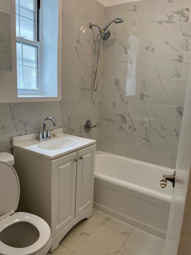 88-11 Elmhurst Ave Unit D15, Elmhurst, NY 11373 - bathroom featuring  shower combination, marble finish flooring, and vanity