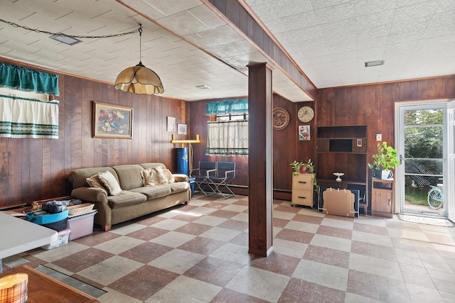 2088 Virgil Pl, Bronx, NY 10473 - living room with wood walls, tile patterned floors, and baseboard heating