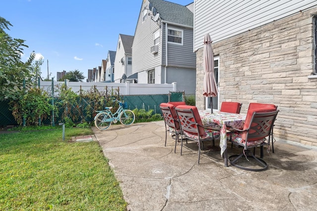 2088 Virgil Pl, Bronx, NY 10473 - view of patio / terrace featuring outdoor dining space and cooling unit