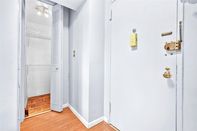 68-15 Selfridge St Unit 5D, Forest Hills, NY 11375 - hallway featuring light wood-style floors and baseboards