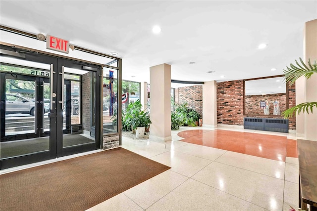 68-15 Selfridge St Unit 5D, Forest Hills, NY 11375 - common area featuring brick wall and recessed lighting
