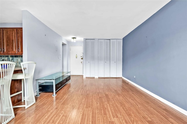 68-15 Selfridge St Unit 5D, Forest Hills, NY 11375 - living room featuring light wood-type flooring and baseboards