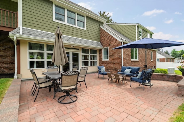 85 Jay St, Stony Point, NY 10980 - view of patio / terrace with an outdoor living space, outdoor dining space, and french doors