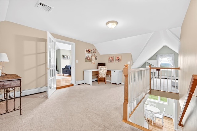 85 Jay St, Stony Point, NY 10980 - hallway featuring baseboard heating, vaulted ceiling, healthy amount of natural light, and a baseboard radiator