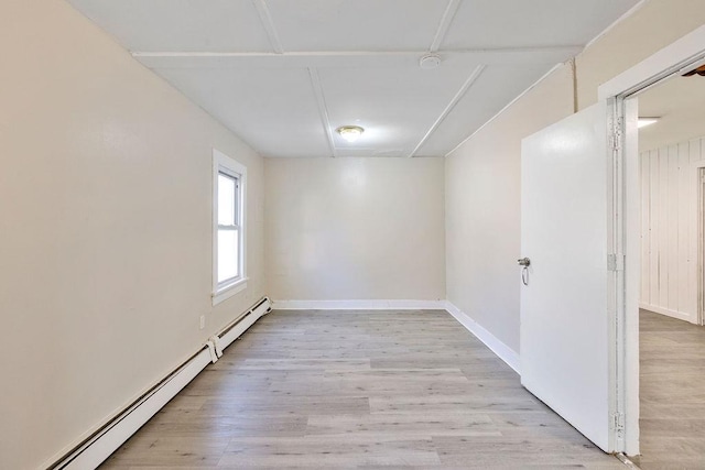 33 N Rte 303, Congers, NY 10920 - unfurnished room featuring baseboard heating and light wood-style floors