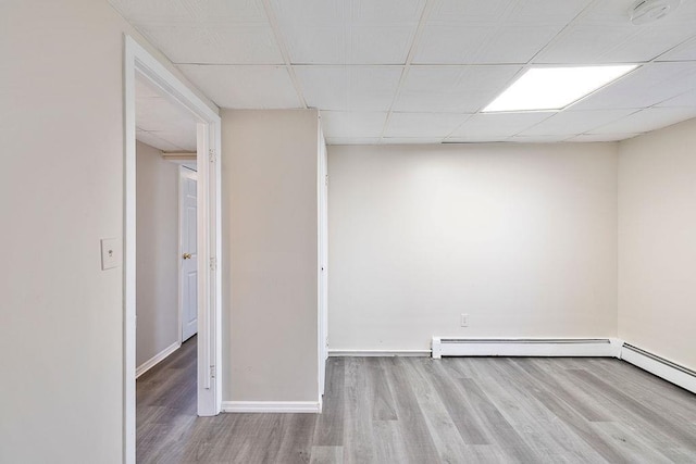 33 N Rte 303, Congers, NY 10920 - spare room featuring wood finished floors, a smoke detector, and a baseboard radiator