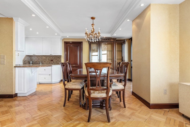 11201 Queens Blvd Unit 10B, Forest Hills, NY 11375 - dining room featuring a chandelier, recessed lighting, a tray ceiling, and crown molding