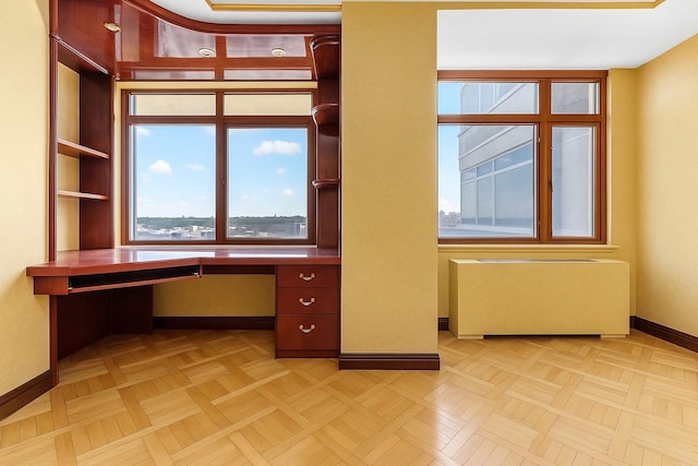 11201 Queens Blvd Unit 10B, Forest Hills, NY 11375 - unfurnished office featuring radiator heating unit and built in desk