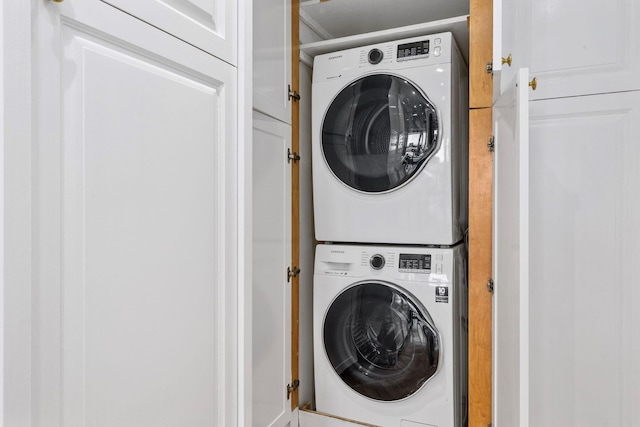 11201 Queens Blvd Unit 10B, Forest Hills, NY 11375 - washroom with stacked washing machine and dryer