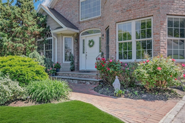 26 Sesame St, Kings Park, NY 11754 - doorway to property featuring a yard
