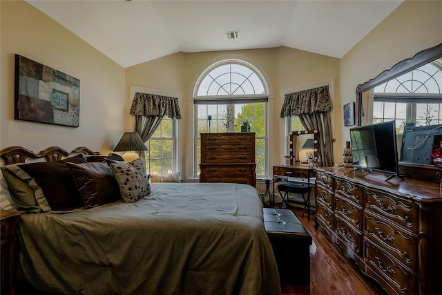 26 Sesame St, Kings Park, NY 11754 - bedroom with dark wood-type flooring and vaulted ceiling