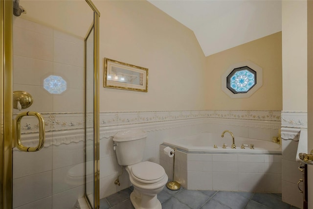 26 Sesame St, Kings Park, NY 11754 - bathroom featuring tile patterned flooring, a garden tub, wainscoting, vaulted ceiling, and a stall shower
