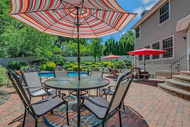 26 Sesame St, Kings Park, NY 11754 - fenced backyard with a patio and outdoor dining area