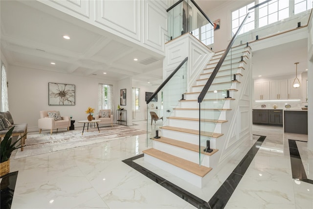 52 Cortland Ave, Hicksville, NY 11801 - staircase featuring marble tiled flooring, recessed lighting, ornamental molding, and coffered ceiling