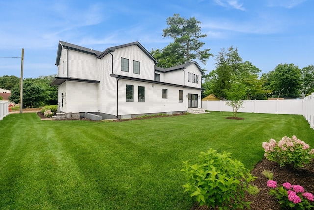 52 Cortland Ave, Hicksville, NY 11801 - rear view of house featuring a fenced backyard and entry steps