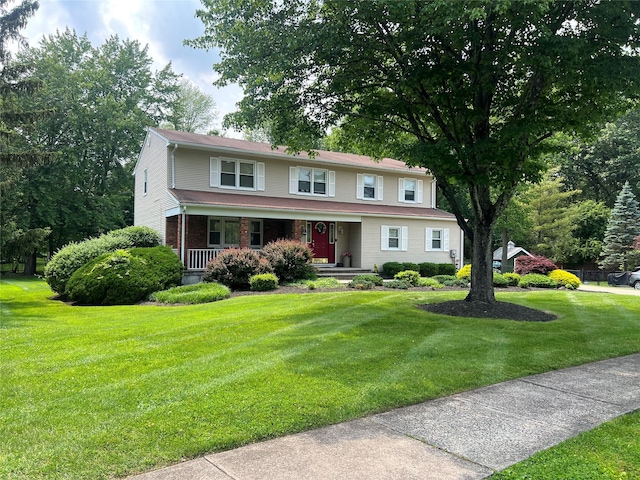 7 Woodland Ter, Orangeburg, NY 10962 - traditional home with covered porch and a front yard