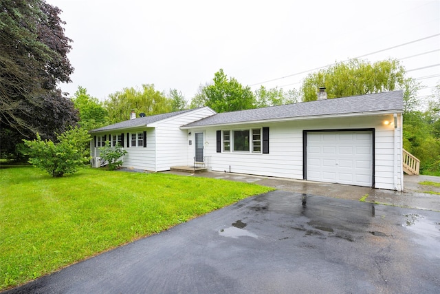 16 Bushwick Rd, Poughkeepsie, NY 12603 - ranch-style home with a chimney, an attached garage, a front lawn, and asphalt driveway