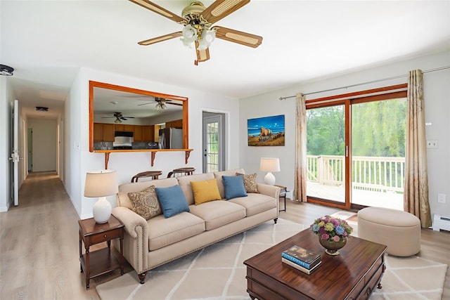 16 Bushwick Rd, Poughkeepsie, NY 12603 - living area with a ceiling fan, light wood-style floors, and healthy amount of natural light