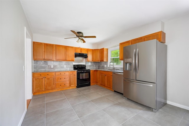 16 Bushwick Rd, Poughkeepsie, NY 12603 - kitchen featuring stainless steel appliances, under cabinet range hood, ceiling fan, tasteful backsplash, and light tile patterned flooring