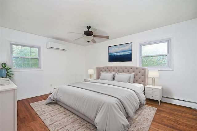 16 Bushwick Rd, Poughkeepsie, NY 12603 - bedroom featuring a wall unit AC, a baseboard heating unit, a ceiling fan, and dark wood-style floors