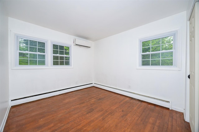 16 Bushwick Rd, Poughkeepsie, NY 12603 - spare room featuring a wall mounted AC, baseboard heating, plenty of natural light, and dark wood-type flooring