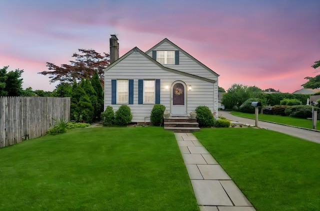 29 E St, Hicksville, NY 11801 - view of front of home with a chimney