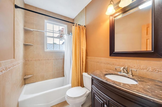 29 E St, Hicksville, NY 11801 - full bathroom featuring vanity, shower / tub combo, and tile walls