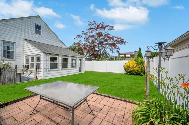 29 E St, Hicksville, NY 11801 - fenced backyard with a patio