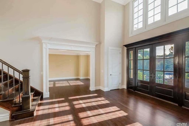 19 Meadow Glen Rd, Fort Salonga, NY 11768 - entrance foyer with a towering ceiling, french doors, wood finished floors, and stairway