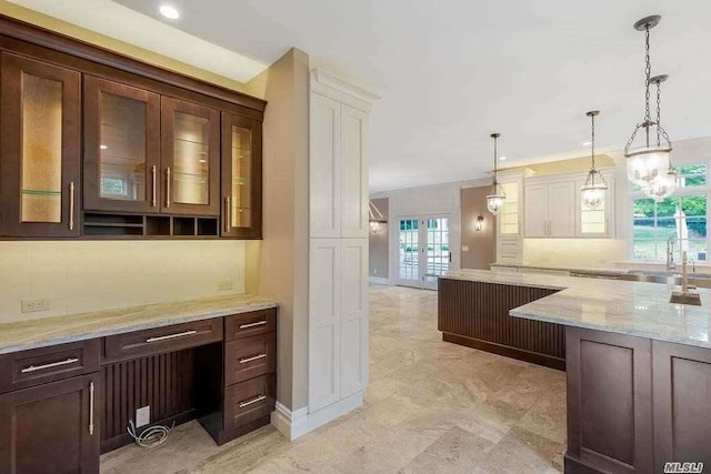 19 Meadow Glen Rd, Fort Salonga, NY 11768 - bar area with pendant lighting, decorative backsplash, and recessed lighting