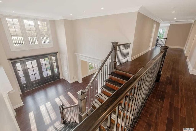 19 Meadow Glen Rd, Fort Salonga, NY 11768 - stairs with wood finished floors, crown molding, and recessed lighting