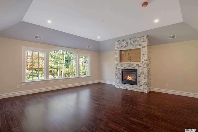 19 Meadow Glen Rd, Fort Salonga, NY 11768 - unfurnished living room with lofted ceiling, wood-type flooring, and a fireplace