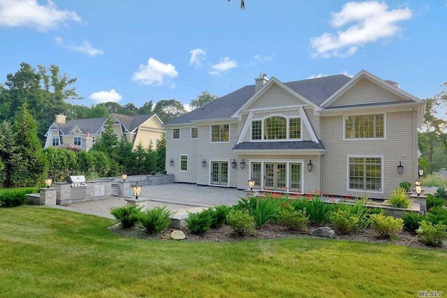 19 Meadow Glen Rd, Fort Salonga, NY 11768 - rear view of property with area for grilling, a lawn, a patio area, french doors, and a chimney