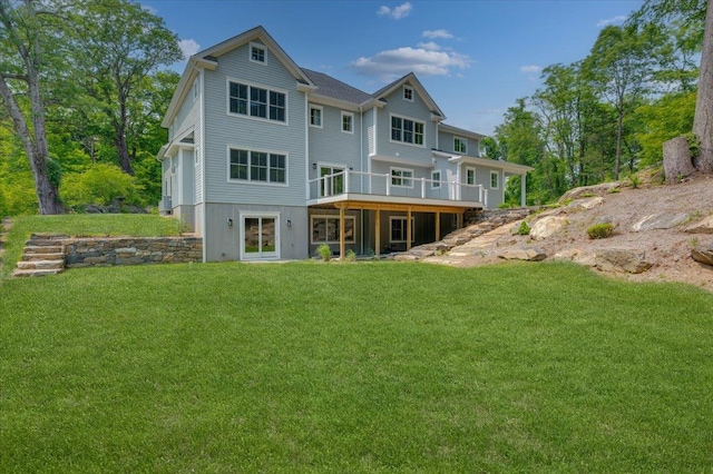 63 Buckout Rd, West Harrison, NY 10604 - back of house with a wooden deck and a lawn