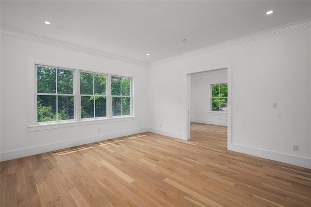 63 Buckout Rd, West Harrison, NY 10604 - empty room featuring plenty of natural light, crown molding, light wood-style flooring, and recessed lighting