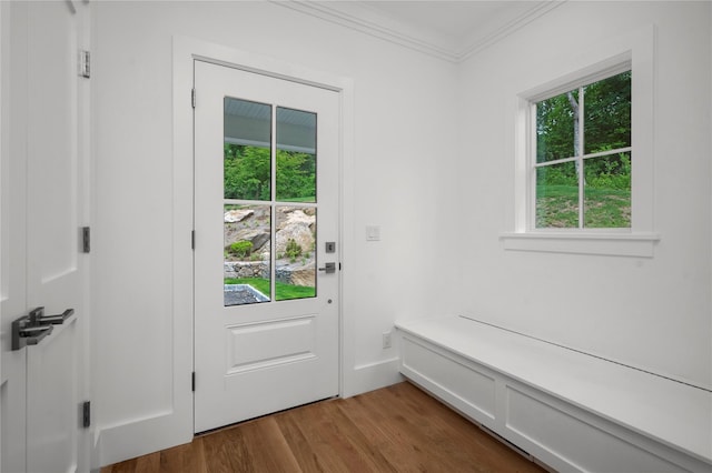 63 Buckout Rd, West Harrison, NY 10604 - doorway featuring healthy amount of natural light, wood finished floors, and crown molding