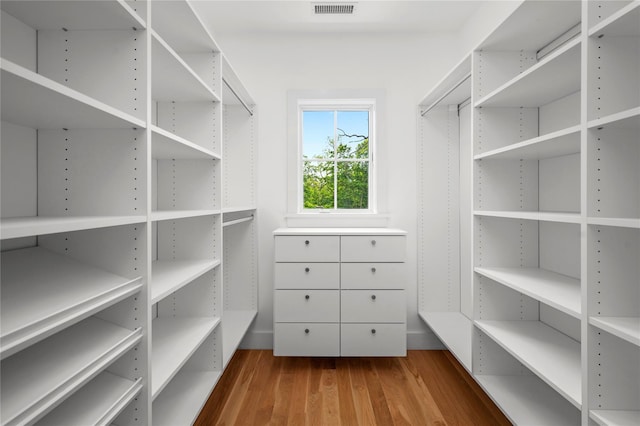 63 Buckout Rd, West Harrison, NY 10604 - walk in closet featuring wood finished floors