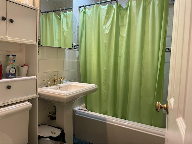 24580 61st Ave Unit 68Th, Little Neck, NY 11362 - full bathroom with shower / bathtub combination with curtain, tile walls, and decorative backsplash