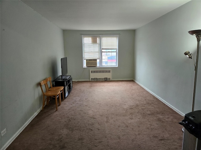 6393 Woodhaven Blvd Unit 2F, Rego Park, NY 11374 - unfurnished room with radiator heating unit, carpet flooring, and cooling unit