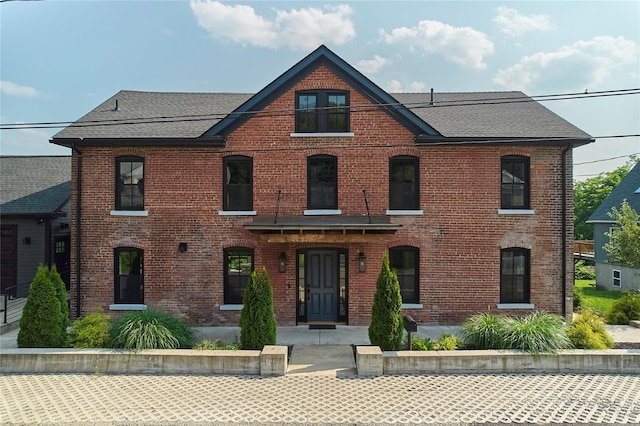 20 Paye Ave, Beacon, NY 12508 - tudor-style house featuring brick siding and roof with shingles