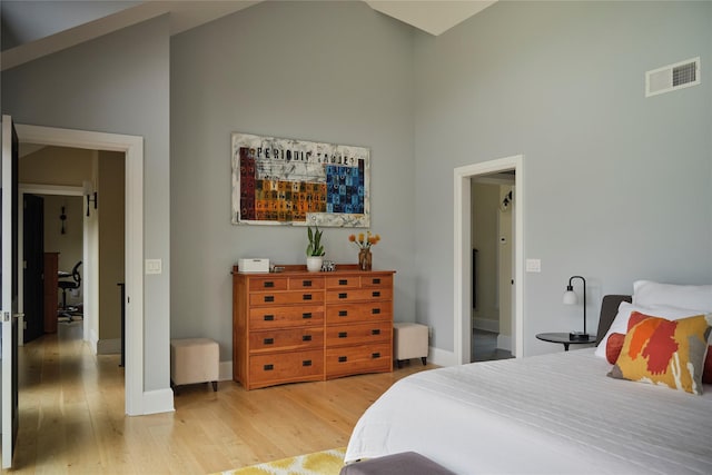 20 Paye Ave, Beacon, NY 12508 - bedroom with light wood-type flooring and high vaulted ceiling