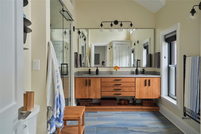 20 Paye Ave, Beacon, NY 12508 - bathroom featuring a shower stall, double vanity, and lofted ceiling