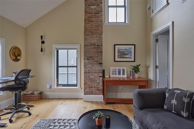 20 Paye Ave, Beacon, NY 12508 - living room with high vaulted ceiling, wood finished floors, and a desk