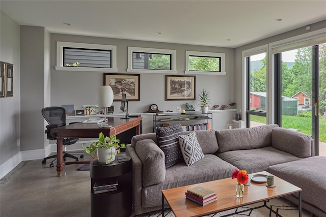 20 Paye Ave, Beacon, NY 12508 - living room with an office area and concrete flooring